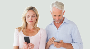 Groton couple using smartphones