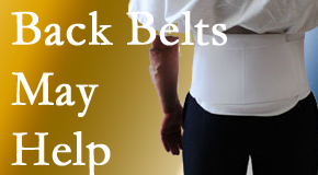Groton back pain sufferers wearing back support belts are supported and reminded to move carefully while healing.